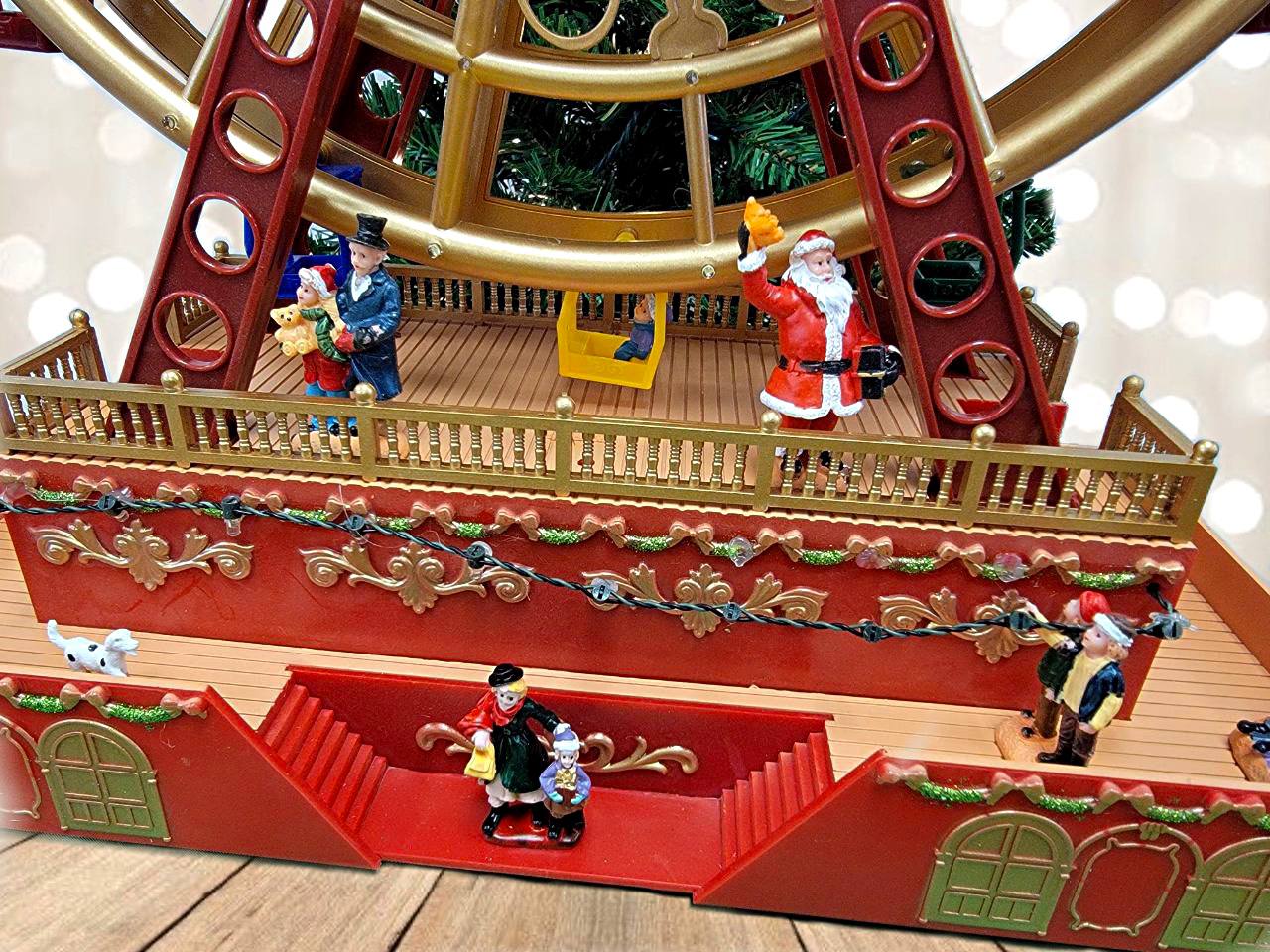 Christmas Wheel with Santa. Animated Holiday Decoration. Christmas Village F07M4-6-W222-2